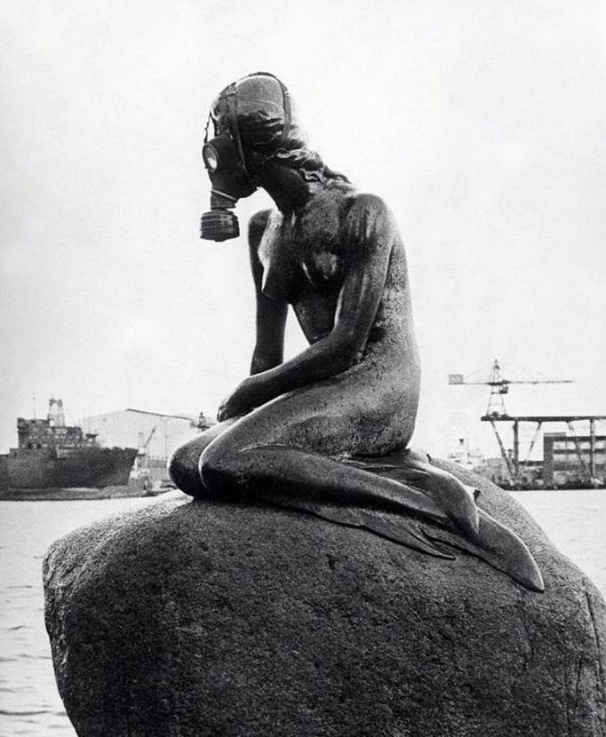 Statue of The Little Mermaid in a gas mask during protests against environmental pollution in Copenhagen, Denmark - Copenhagen, 1971