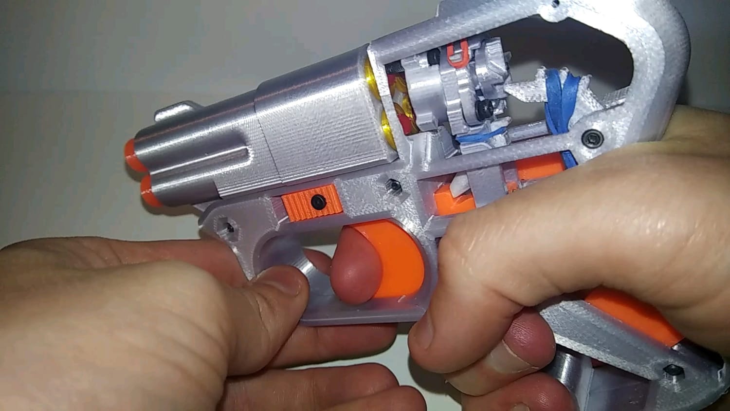 A really neat double action trigger mechanism for a toy pepperbox derringer pistol.