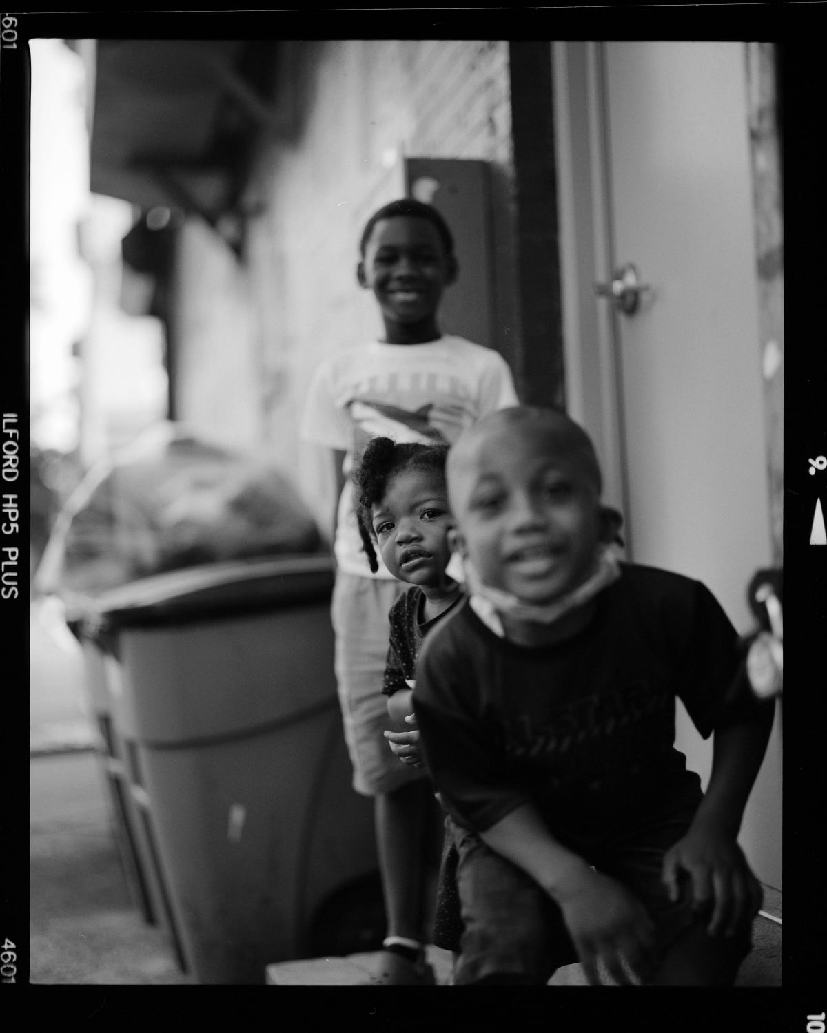 A few curious kids in Brooklyn [Pentax 67 | 105mm 2.4 | HP5+]