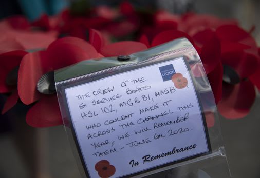 One man lays wreaths in Normandy on this unusual D-Day anniversary
