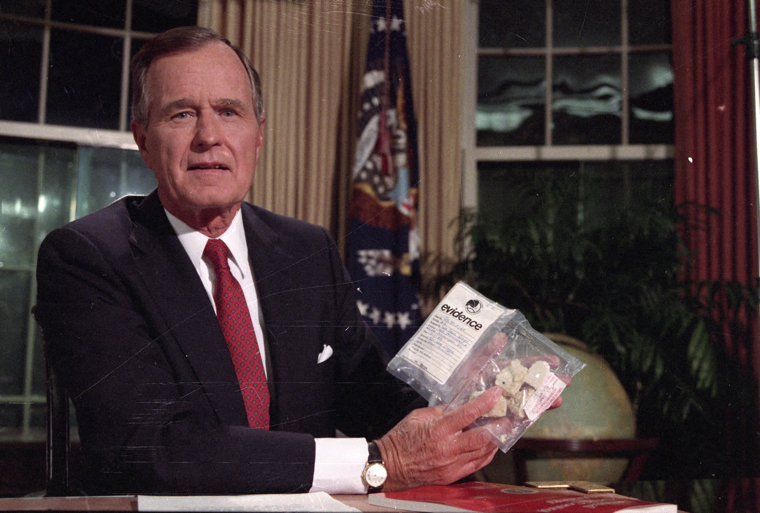President George H. W. Bush holds up a bag of crack cocaine during a 1989 televised speech. Bush called drugs “the gravest domestic threat facing our nation.”