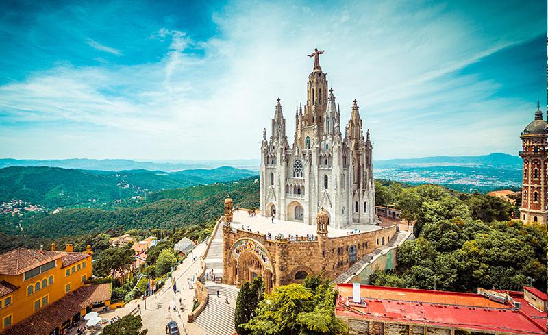 Expiatory Church of the Sacred Heart of Jesus - Barcelona, Spain - Built from 1902 to 1961 by Spanish architect Enric Sagnier - The appearance of the church is of a Romanesque fortress of stone from Montjuïc (the crypt), topped by a monumental Neo-Gothic church accessed by two grand staircases