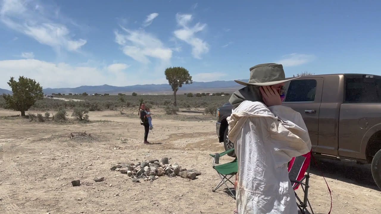 Dust Devil Harmlessly Passes Through Spectator While He Watches it With Family - 1203650