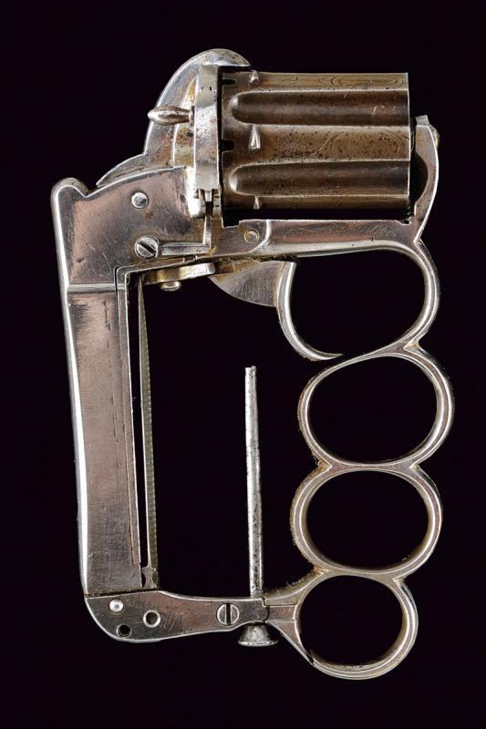 Pocket protection in 1870. A Delhaxe-type Knuckleduster/Revolver, produced in Liege, Belgium, circa 1870.