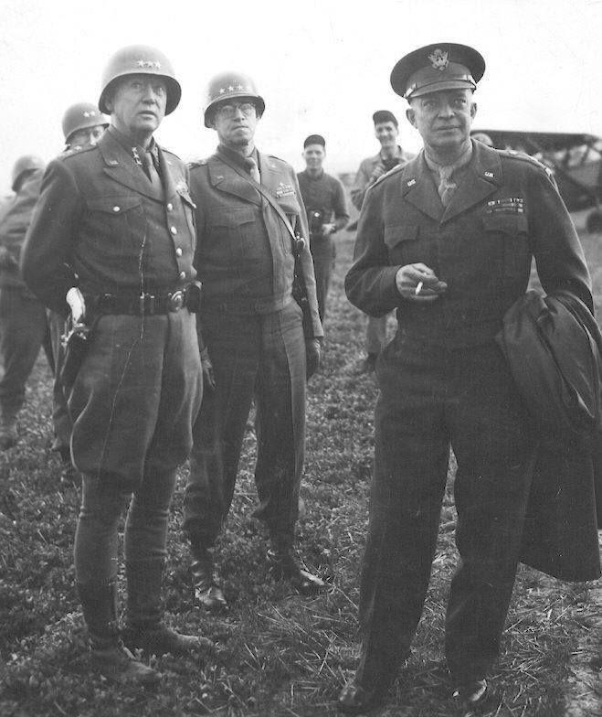 From left to right: Three star General George Patton Jr, Four star General Omar Bradley, and Supreme Allied Commander and future US President Dwight D. Eisenhower. France 1944.