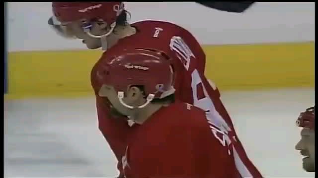 Unlucky Bounce: Patrick Roy shows the world his glove minus puck