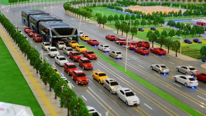 Chinese electric straddling bus allows cars to pass underneath