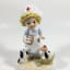 Nurse with Puppies Ceramic Collectible by Napcoware Bone China