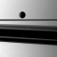Cassini catching a glimpse of the ice moon Rhea through Saturn’s rings