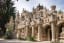 The "Palais du facteur Cheval" is a French historical monument built entirely by one man, a letter carrier who never studied architecture or masonry, Ferdinand Cheval. He spent 33 years building it and finished it at 77 years old.