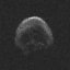 Halloween is ending. This is a skull shaped dead comet pictured by NASA which flew past Earth.