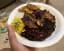 I made jerk chicken with rice, black beans, plantains and a mango salsa.