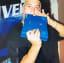 Eminem with a now-rare Playstation 1 model, released in 1995