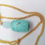 Turquoise and Blue Faceted Bead Pendant on a Gold Plated Chain
