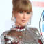 See How Taylor Swift Switched Up Her Style for the American Music Awards