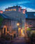 Edinburgh Castle seen from the vennel steps lit with street lamps, Edinburgh, Scotland.