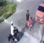 Thief on motorcycle targets mother and young daughter... gets instant karma