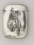 Sterling silver matchsafe featuring an image of a cowboy riding a bucking horse, American, c. 1900.