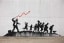 Banksy assails the wickedness of Wall Street