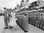 In this photograph from April 1954, The Queen inspects the Royal Guard of Royal Marines from the light cruiser, HMS Newfoundland during her visit to Colombo, Ceylon (now Sri Lanka). PlatinumParty © IWM A 32913