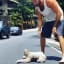 Costa Rica bro helping a sloth cross the road