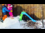 Brother Teaches Sister How To Snowboard On a Makeshift Ramp In Their Backyard - 1178446
