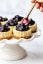 Gluten-Free Mini Cheesecakes with Blueberry Sauce
