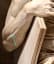 The small details: In the forearms there is one very small muscle that contracts only when lifting the pinky, otherwise it is invisible. Michelangelo's Moses is lifting the pinky, therefore that tiny muscle is contracted - a small part of the many details of this masterpiece