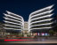 danilof studio illuminates urban office campus in athens with linear white facade lights
