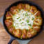 Skillet Pull-Apart Pretzel Buns with Creamy Cheese Dip