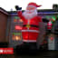Giant 20ft Santa towers over house
