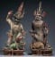 Two ceramic tomb guardians holding snakes. China, Tang dynasty, 8th century AD