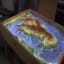 This Augmented reality sandbox allows you to interact with topographic maps