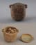 A tiny 2,700-year-old jar containing cosmetic face cream made of moonmilk (stalactite powder). China, Eastern Zhou period, around 700 BC