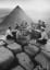 An old photo showing a party at the summit of the 4600-year-old Great Pyramid of Giza, by life magazine, 1940's