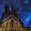 A Twilight Moon Takes a Peek at Historic Church in Barcelona (Photo)