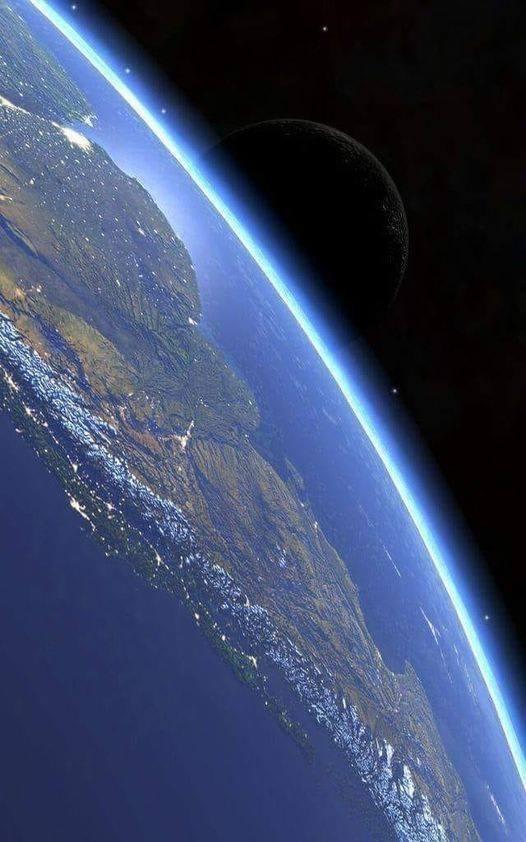 The Atlantic Ocean, the Pacific Ocean. You also see Argentina, Chile, Paraguay and Uruguay. South America. You can see the Andes Mountain Range, view from the ISS. In the background you can see the moon.