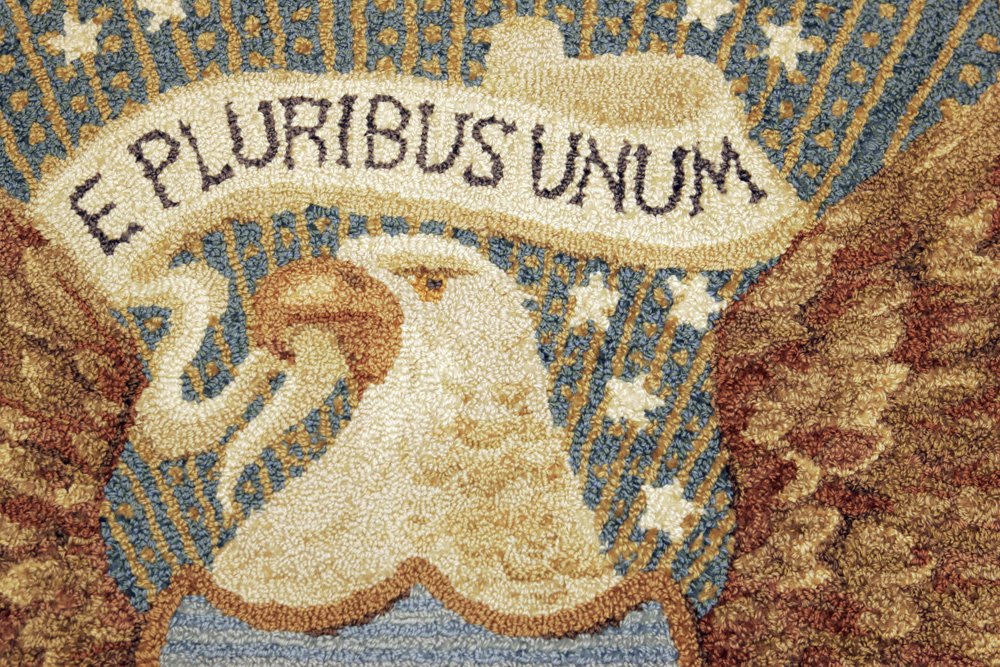 WhiteHouseWednesday Details of the Presidential coat of arms woven into the rug of the Oval Office, 11/30/04. The wool rug was made in 2001 by Edward Fields, Inc., in College Point, New York. @GWBLibrary: