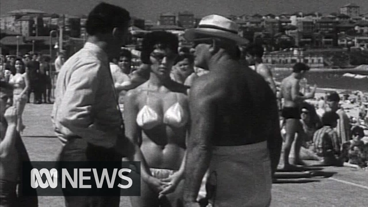 "Should the bikini be banned?" Australian TV news feature w/a roving reporter asking the public the titular question. In what seems like a Monty Python sketch, "beach inspectors" arrive and demand a girl cover up (1961)