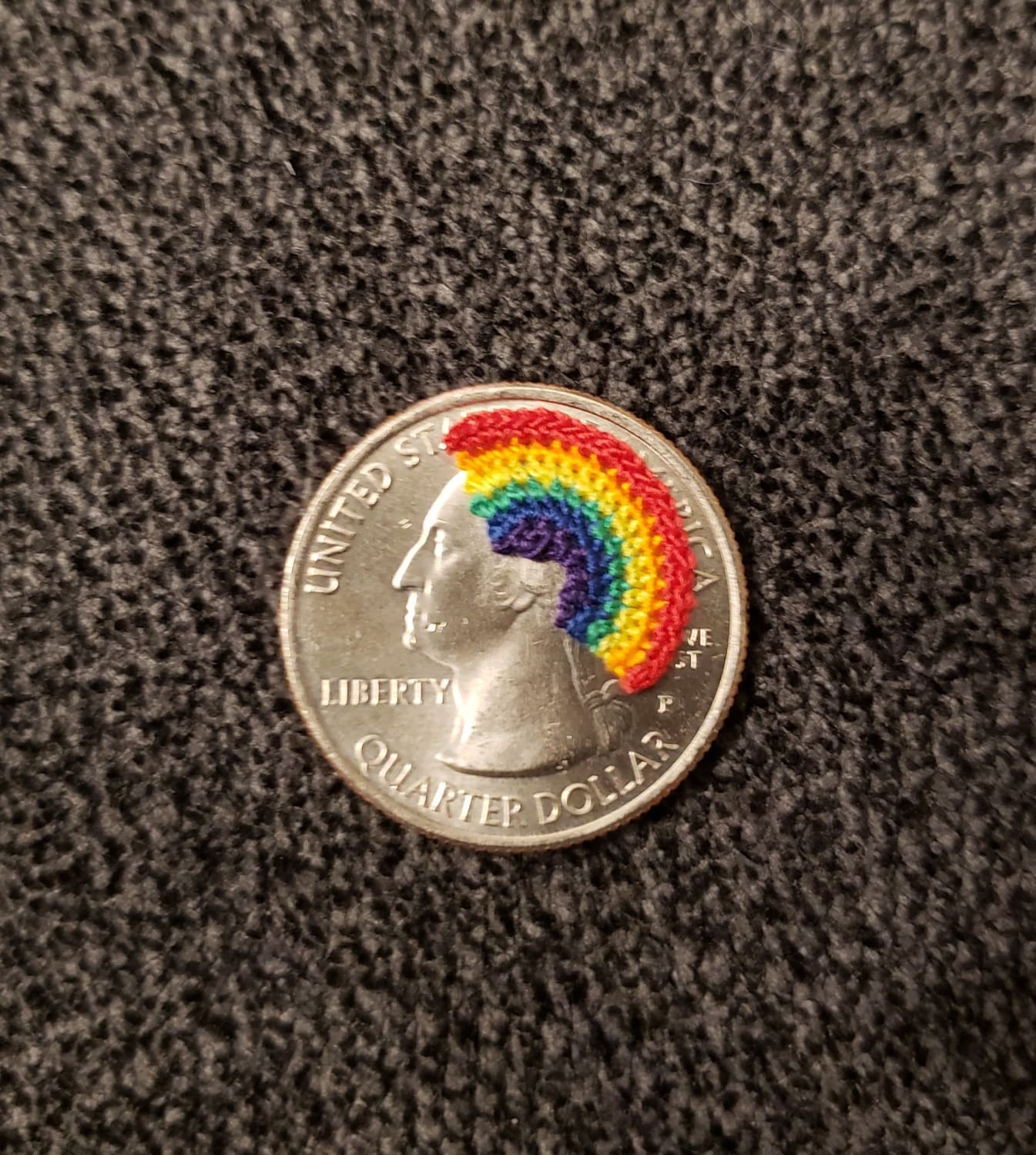 Tiny micro-crochet rainbow.