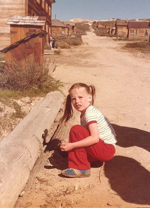 Me, collecting gravel (?) and getting sunburned, in the ghost town of Bodie, CA, early 1980s. I wish I still had those sneaks.