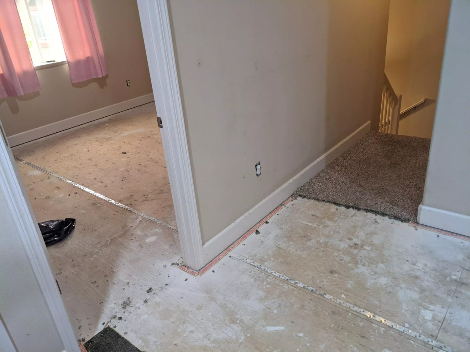First time LVP install, what is this metal strip on 2nd floor subflooring? Safe to go over or remove for install?