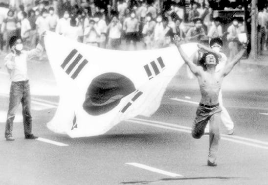 A man on the front in June Democracy Uprising in 1987 in S Korea that ended dictatorship