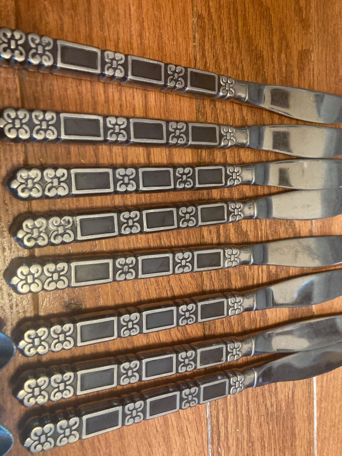 Is there a way to remove the black enamel from stainless steel silverware?