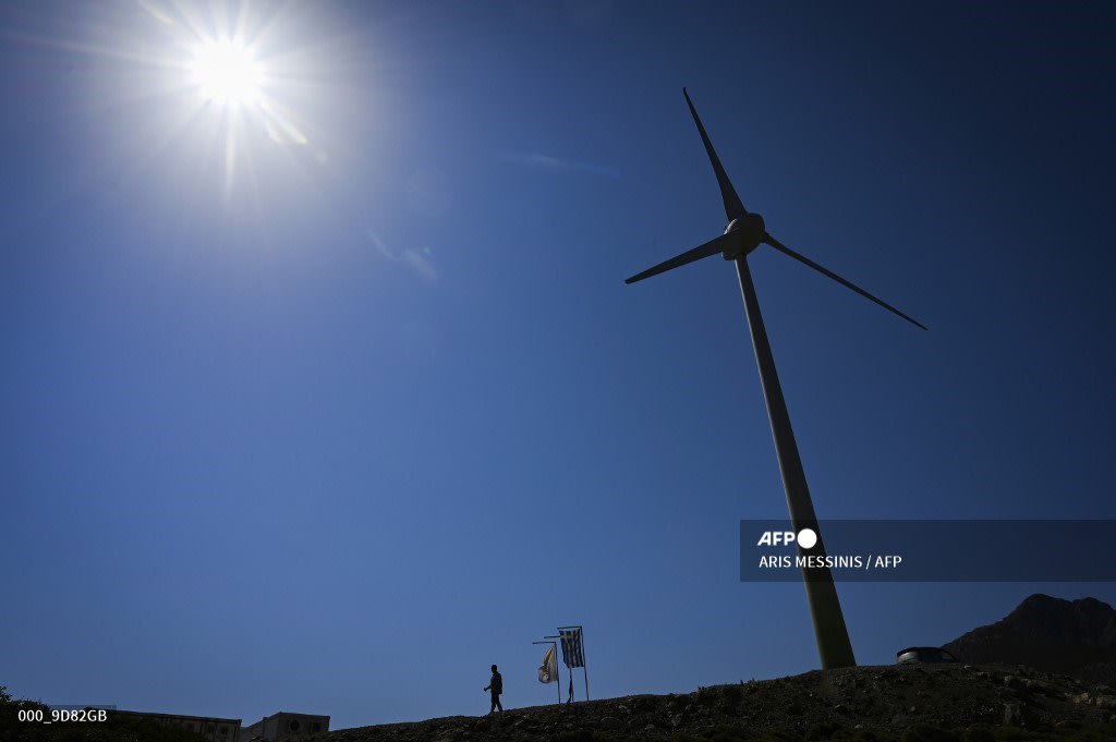 Wind and the sun power Greek islands' green energy switch. AFP
