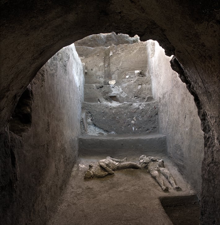 In a ruined Roman villa near Pompeii archaeologists recently uncovered the remains of two men who died fleeing the eruption of Mount Vesuvius in A.D. 79.