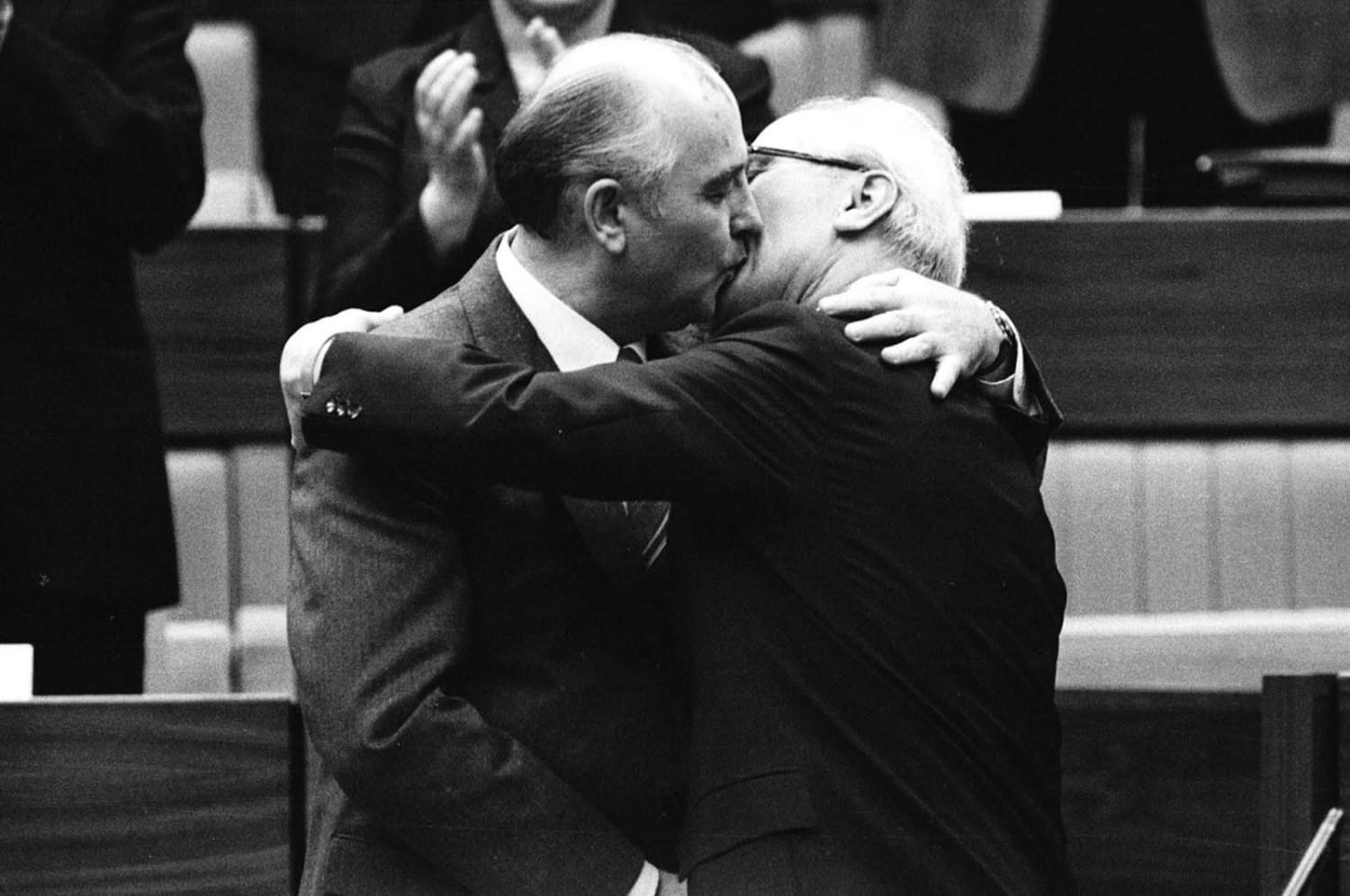 1986, USSR leader Gorbachev and DDR chairman Honecker performing a socialist fraternal kiss