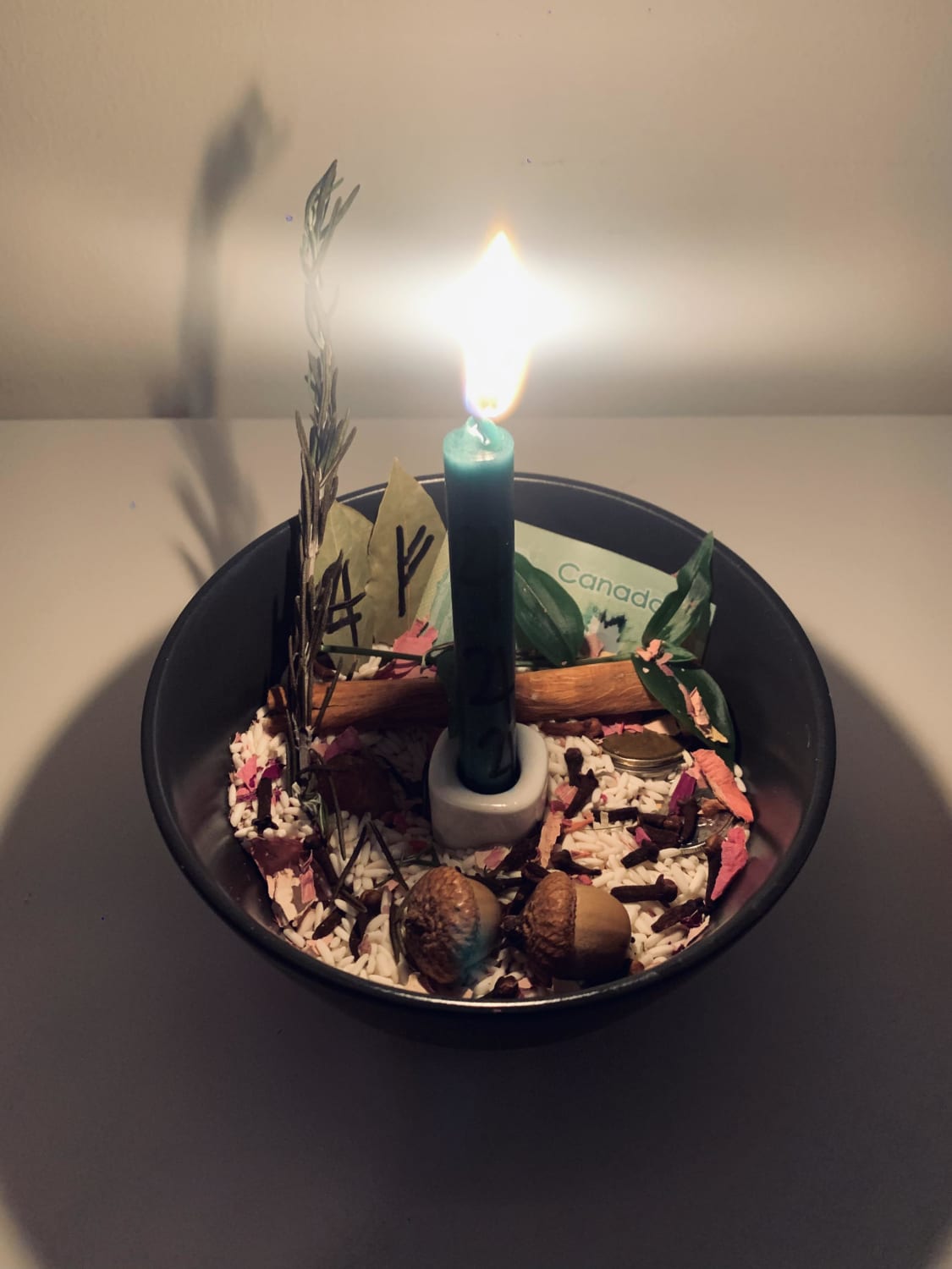 My first money bowl ✨ Lit the candle every night for a week and meditated on an incantation for a few minutes. What do you do like to do with the items used in your spells after completion?