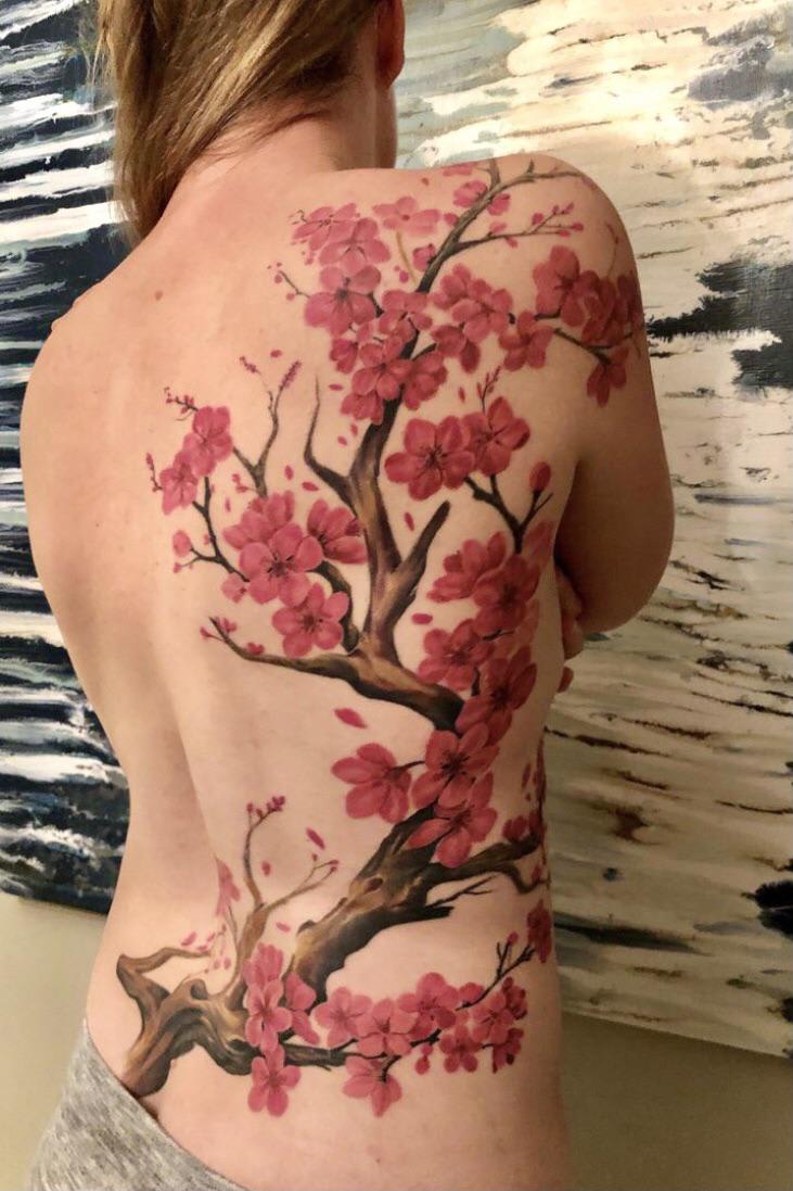 This amazing cherry blossom tattoo took 11 hours to be completed