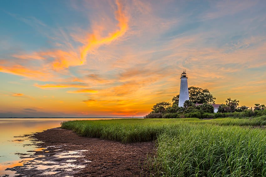 The lighthouse at St. Marks National Wildlife Refuge on Florida’s panhandle guides you to various outdoor recreation activities, including birdwatching, photography, hiking, fishing and biking. Photo by Gregg Gleason